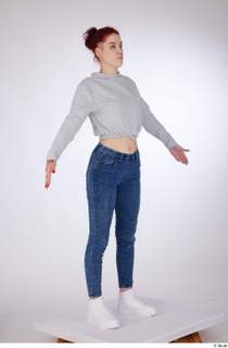 Rada a-pose blue jeans dressed grey long sleeve cropped hoodie…